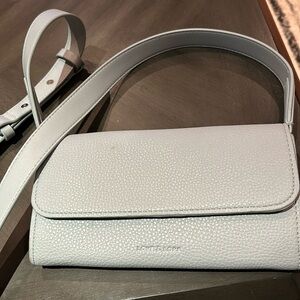 Love and Lore light blue crossbody clutch with removable strap